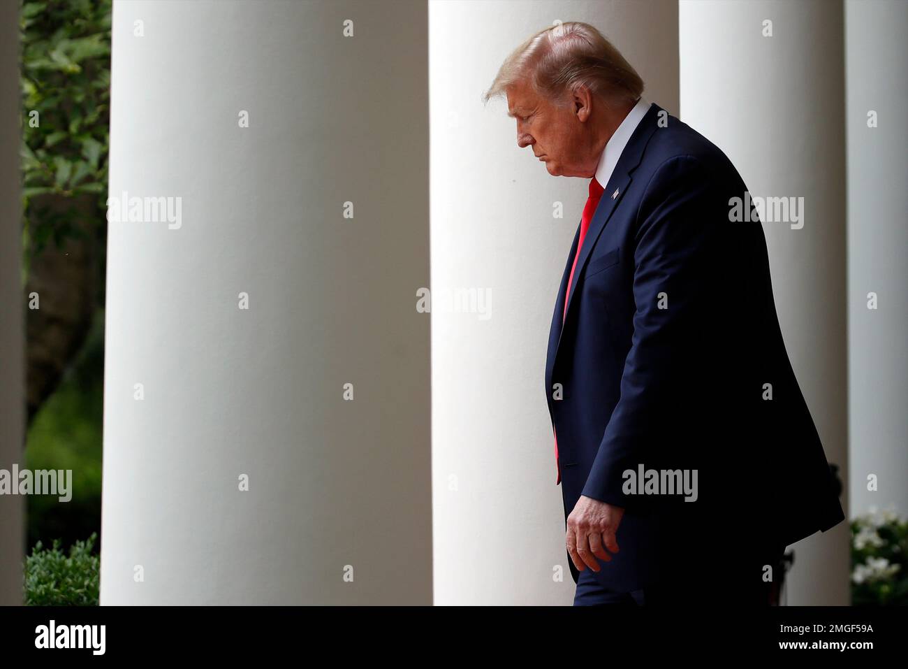 President Donald Trump arrives to speak in the Rose Garden of the White ...
