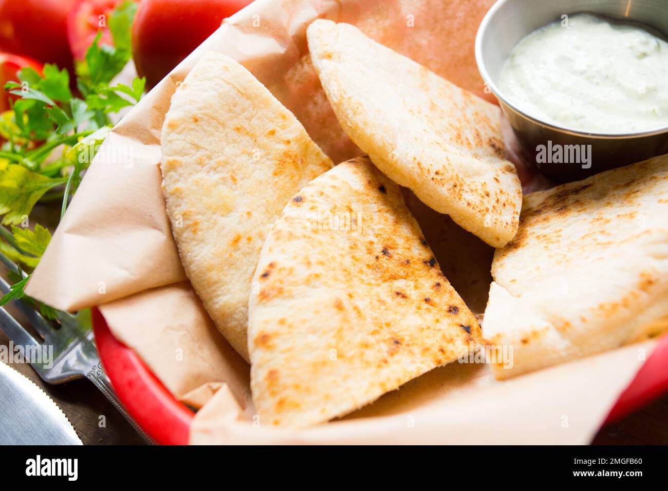 Pita bread is a type of soft, slightly fermented flatbread made from