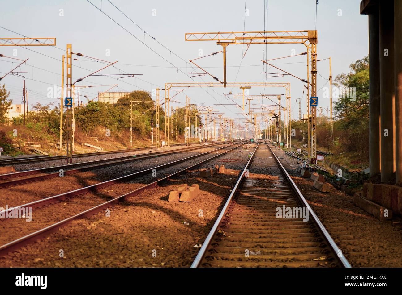 railway track, cable line goes above the rail line to pass electricity