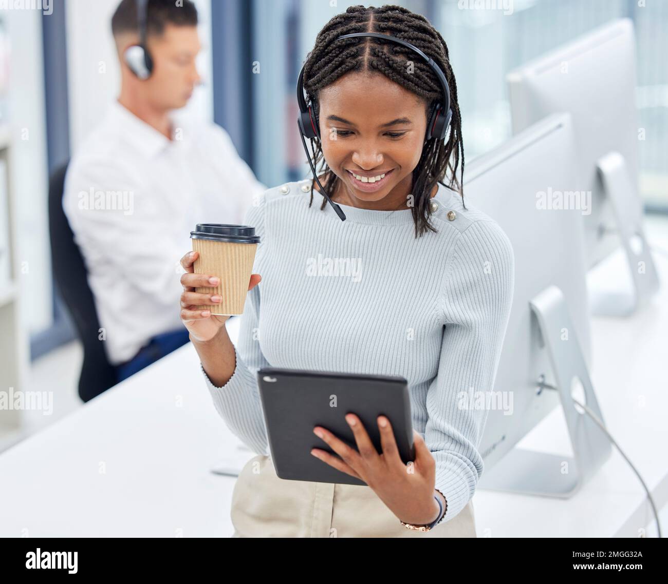 Call center agent, tablet and office for research, focus and analytics