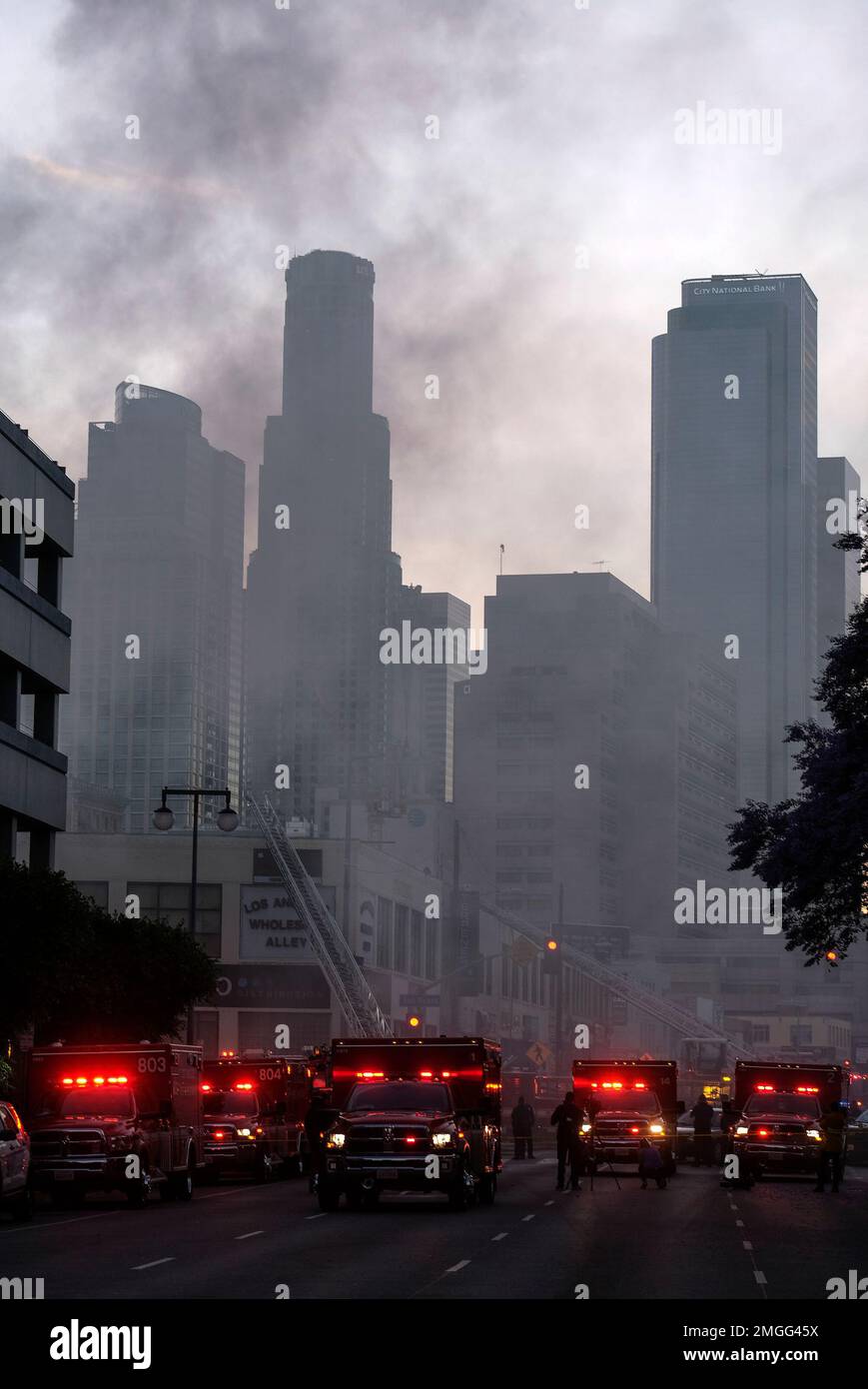 Los Angeles Fire Department firefighters work the scene of a structure ...