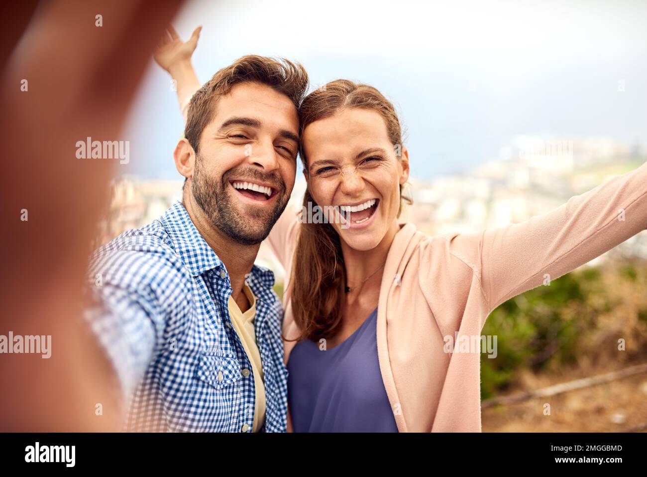 Making wild memories. an affectionate couple taking selfies outside. Stock Photo