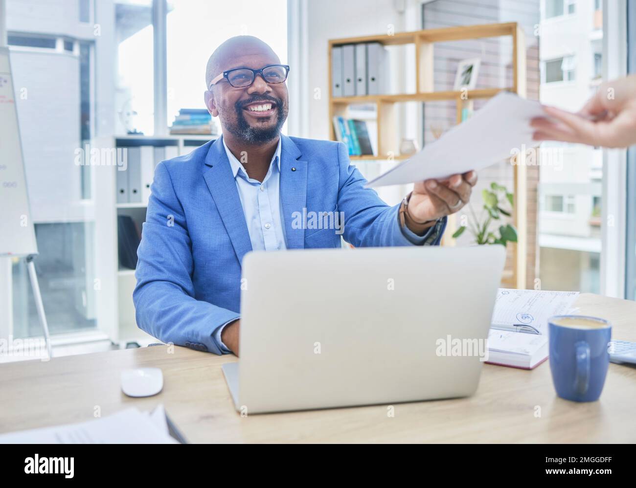 Paper, black man and business computer with accounting worker getting tax return contract. Documents, agenda and finance stock market research of a Stock Photo