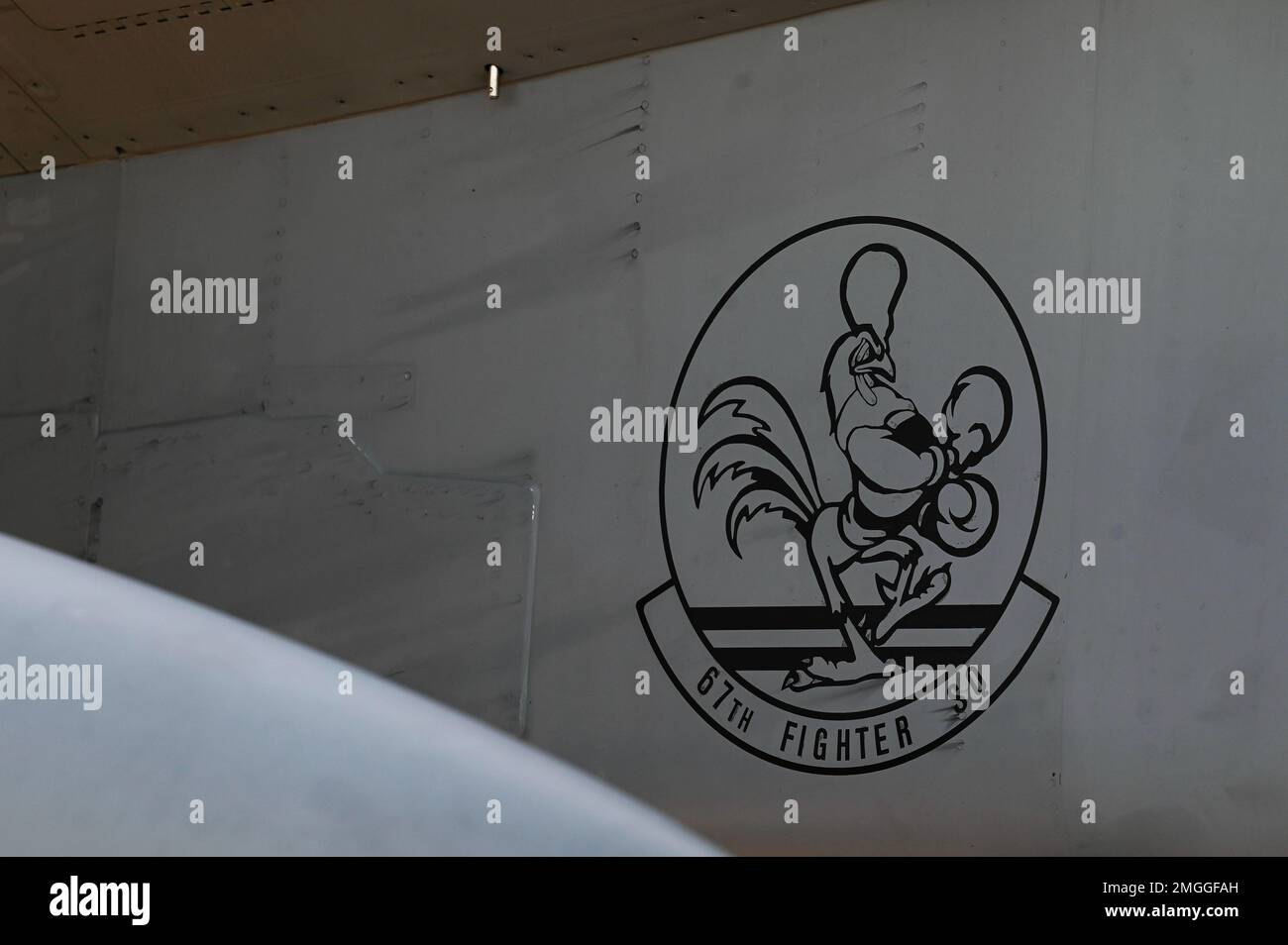 The 67th Fighter Squadron logo is displayed on a U.S. Air Force F-15C Eagle during Exercise Pitch Black 2022 at Royal Australian Air Force Base Darwin, Australia, Aug. 24, 2022. Pitch Black 22 enhances U.S. relationships with regional and global allies and partners by fostering the exchange of information and refining shared tactics, techniques, and procedures. These combined efforts better integrate multilateral defense capabilities and enhance interoperability in support of regional security. Stock Photo
