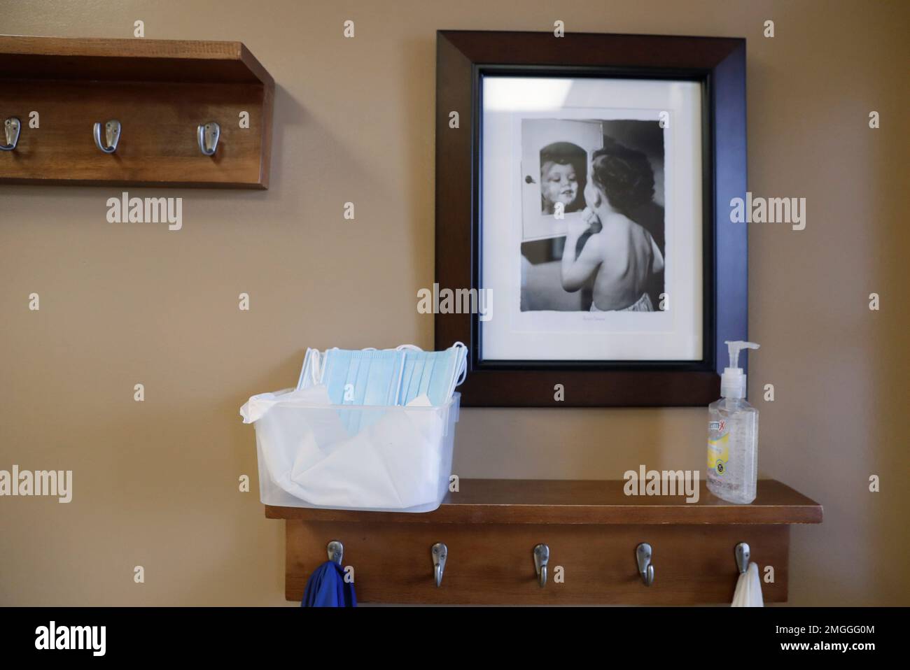 Face mask and hand sanitizer are available for customers as they enter