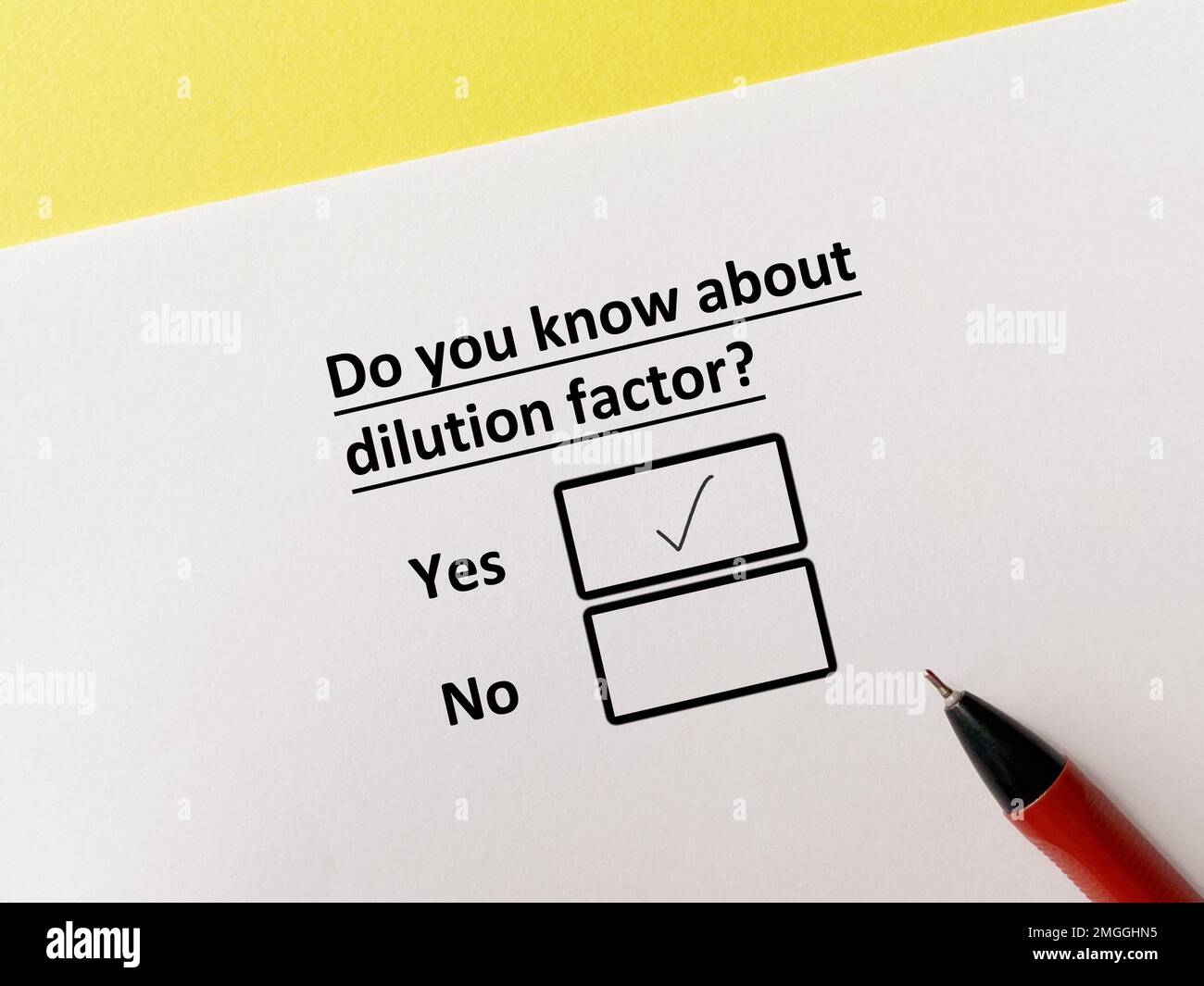 A person is answering question about food manufacturing. He knows about dilution factor. Stock Photo