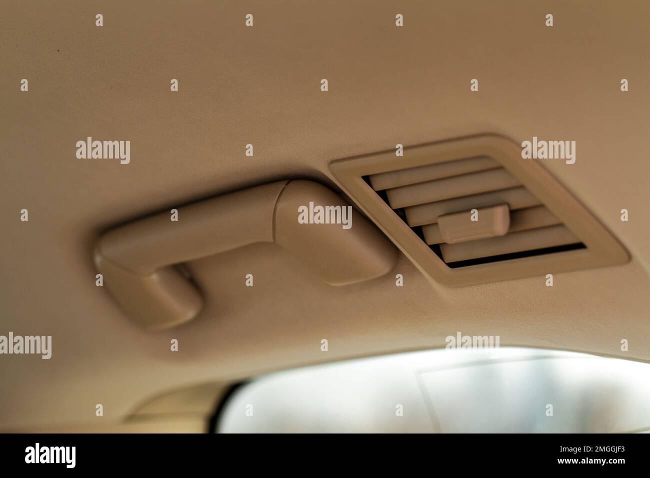 Modern car grab handle, car interior details. Car grab handler for the