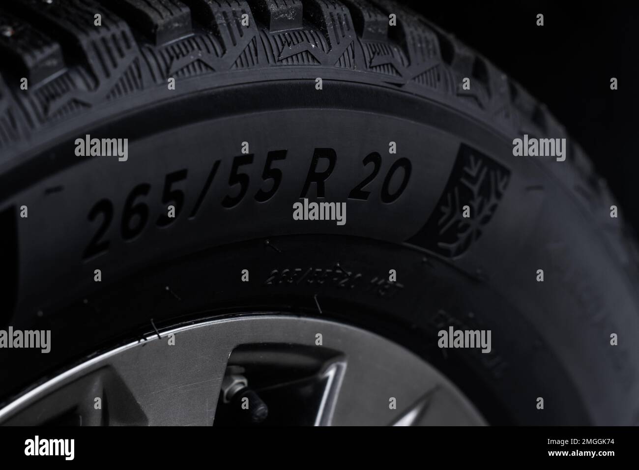 Close up view of tire with tire width, height and wheel diameter