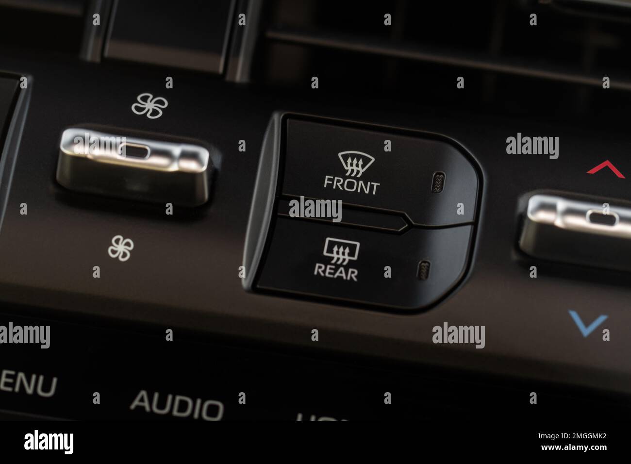 Car rear window heating button. Button of heating mirrors and rear