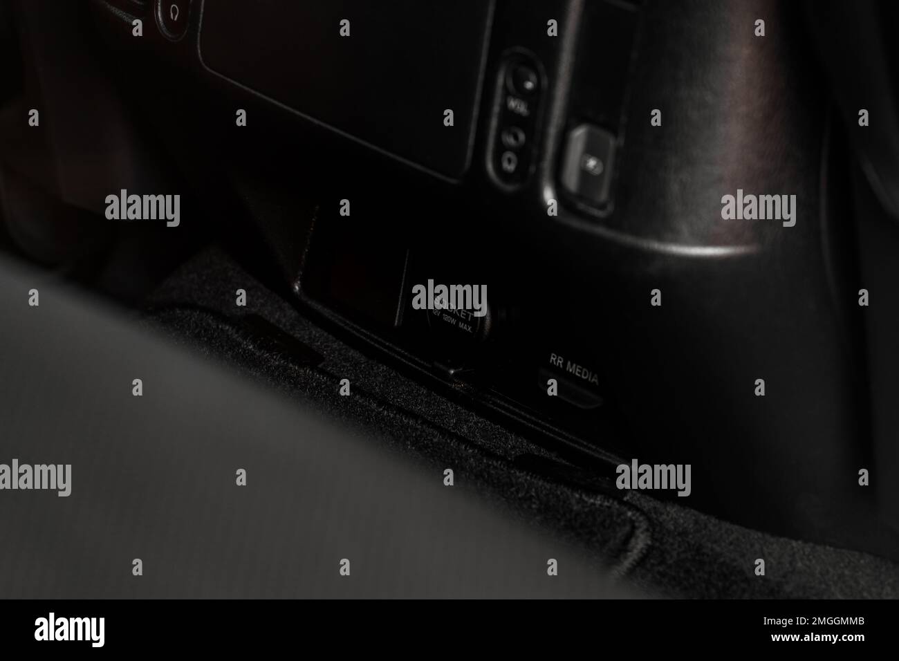 Modern car outlet socket. Closed 12V power outlet socket and opened USB