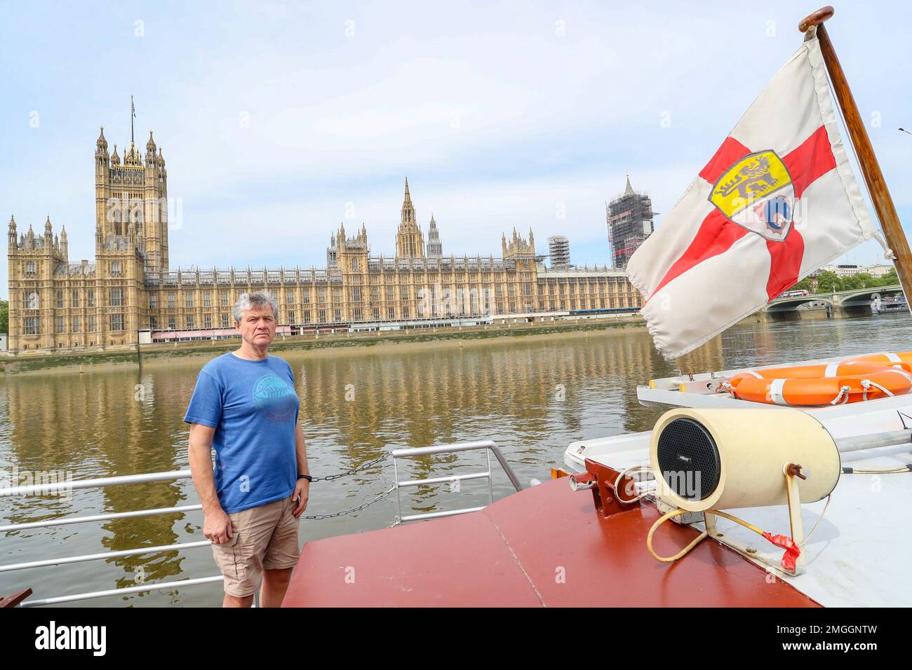 Danny Collier stands on deck aboard his boat, the Princess Freda on the ...