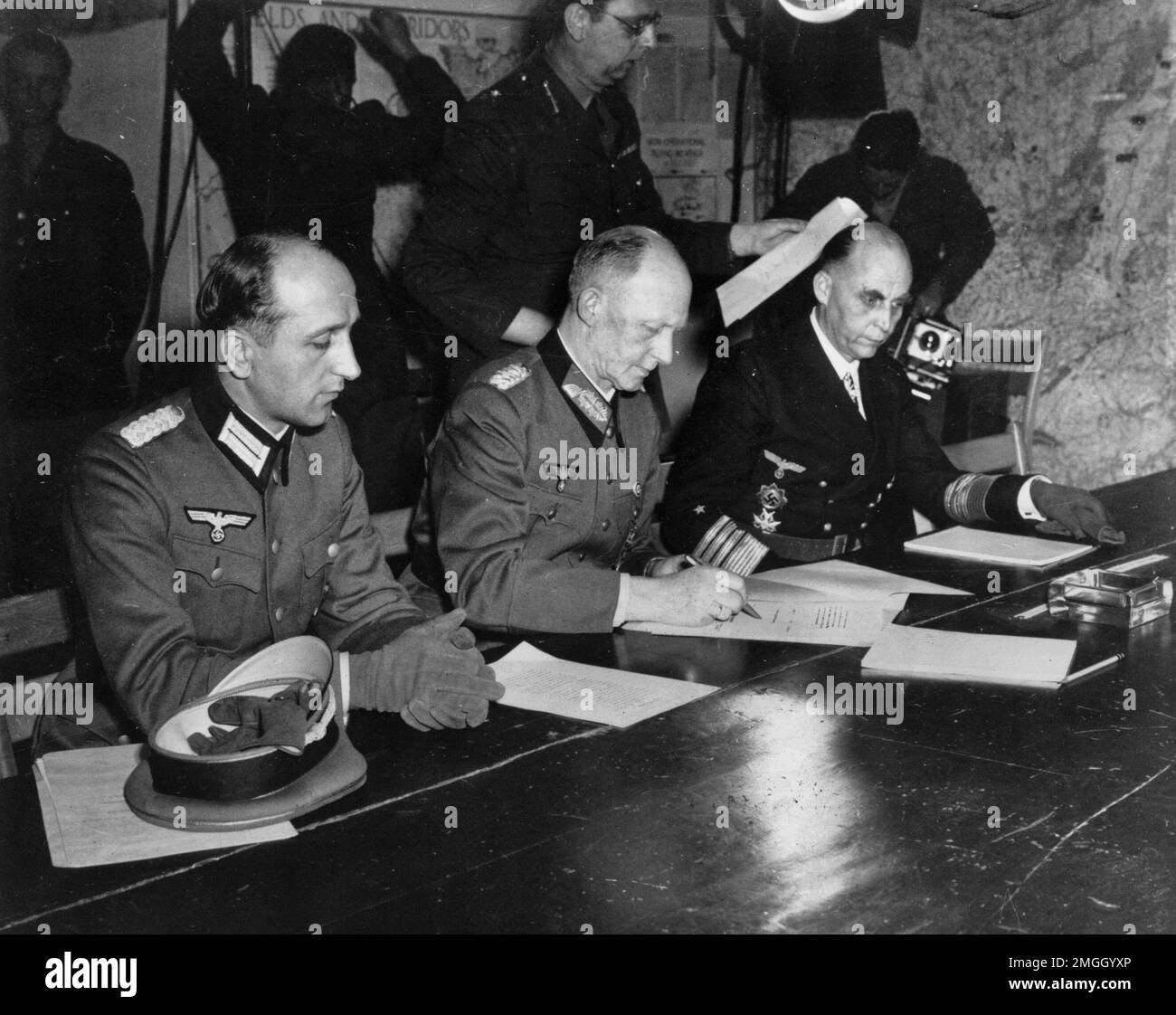 FILE In this May 7, 1945 file photo, Gen. Alfred Jodl, center, signs