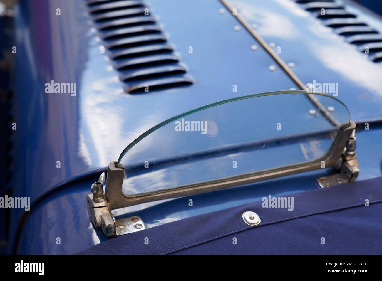 small windshield on an old collector car for motor racing from the