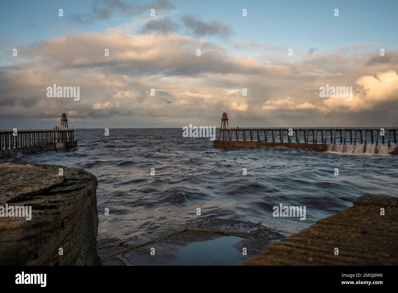 The Victorian lighthouses marking the entrance/exit from the port of Whitby, North Yorkshire, UK Stock Photo