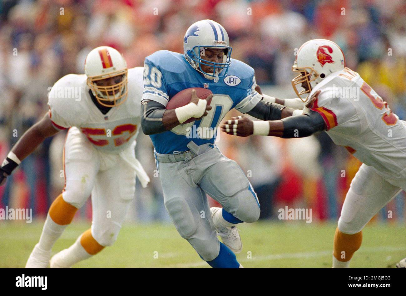 FILE - In this Jan. 12, 1992, file photo, Detroit Lions running back Barry  Sanders, left, looks for room to run against the Washington Redskins during  the second quarter of the NFC championship NFL football game at RFK Stadium  in Washington. Sanders wi