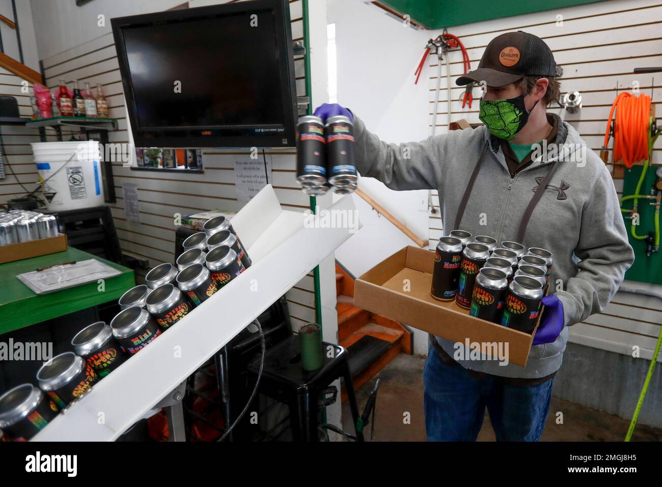 In this april 16 2020 photo shubrew owner zachary shumaker as he feeds