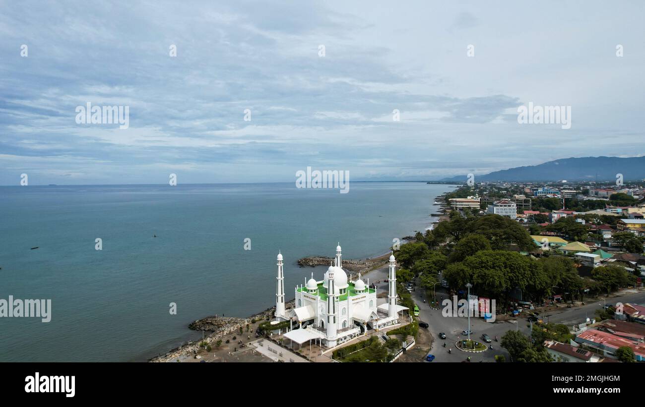 Aerial view of Al-Hakim Mosque Largest Masjid in Padang, Ramadan Eid Concept background, Beautiful Landscape mosque, Islamic background Mosque, Travel Stock Photo