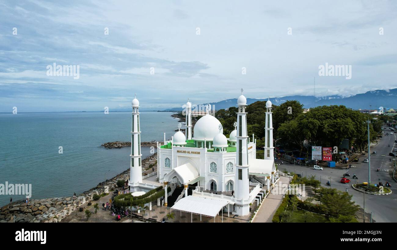 Aerial view of Al-Hakim Mosque Largest Masjid in Padang, Ramadan Eid Concept background, Beautiful Landscape mosque, Islamic background Mosque, Travel Stock Photo