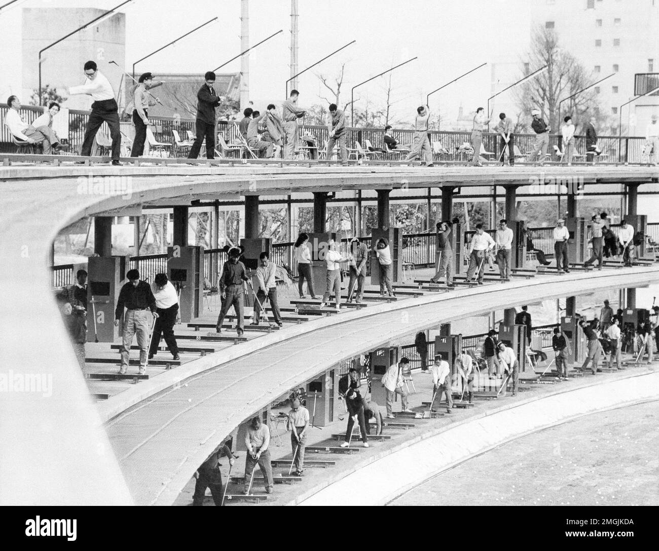 FILE In this April 23, 1963, file photo, devotees of golf in Japan find this three tiered golf