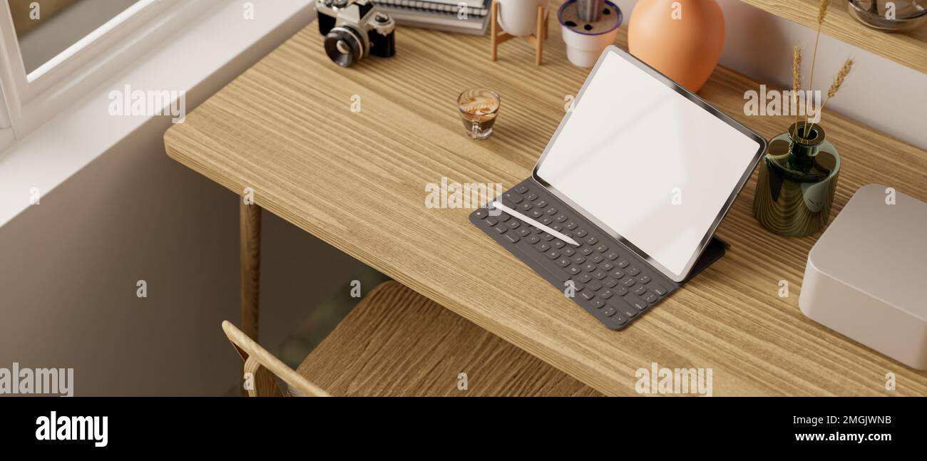 Tabletop Workspace Top view of a minimal and cozy workspace with digital tablet mockup ...