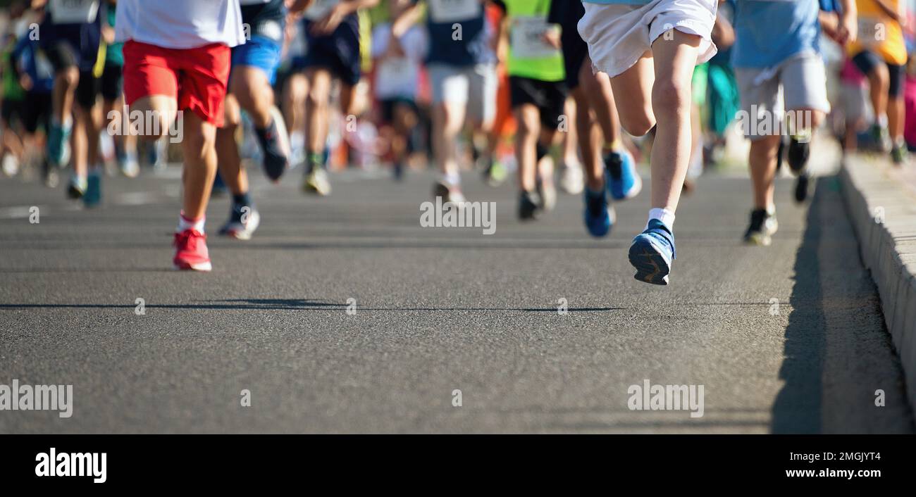 Running children, young athletes run in a kids run race Stock Photo Alamy