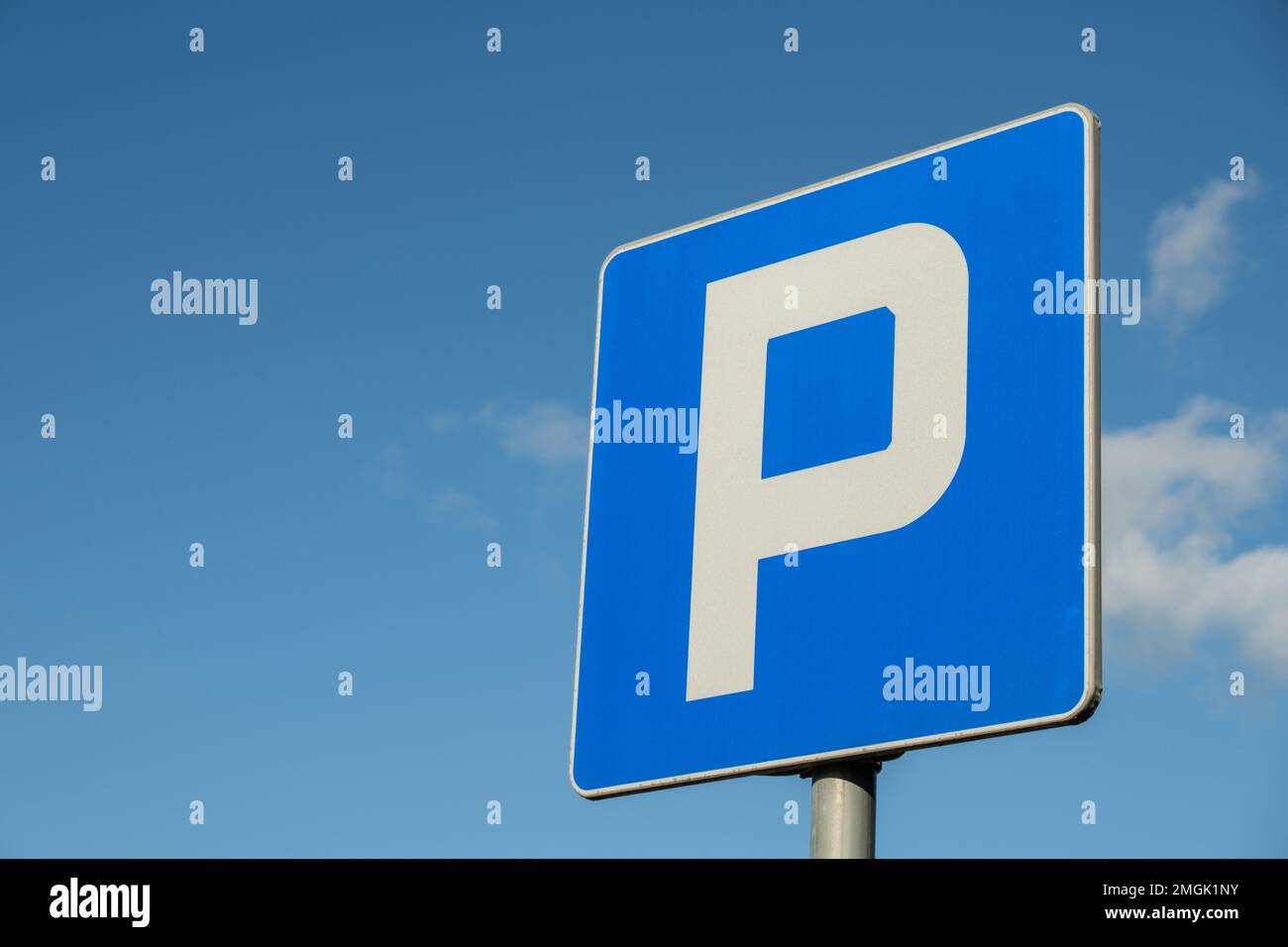 Parking sign showing free places. Traffic parking sign with clean sky