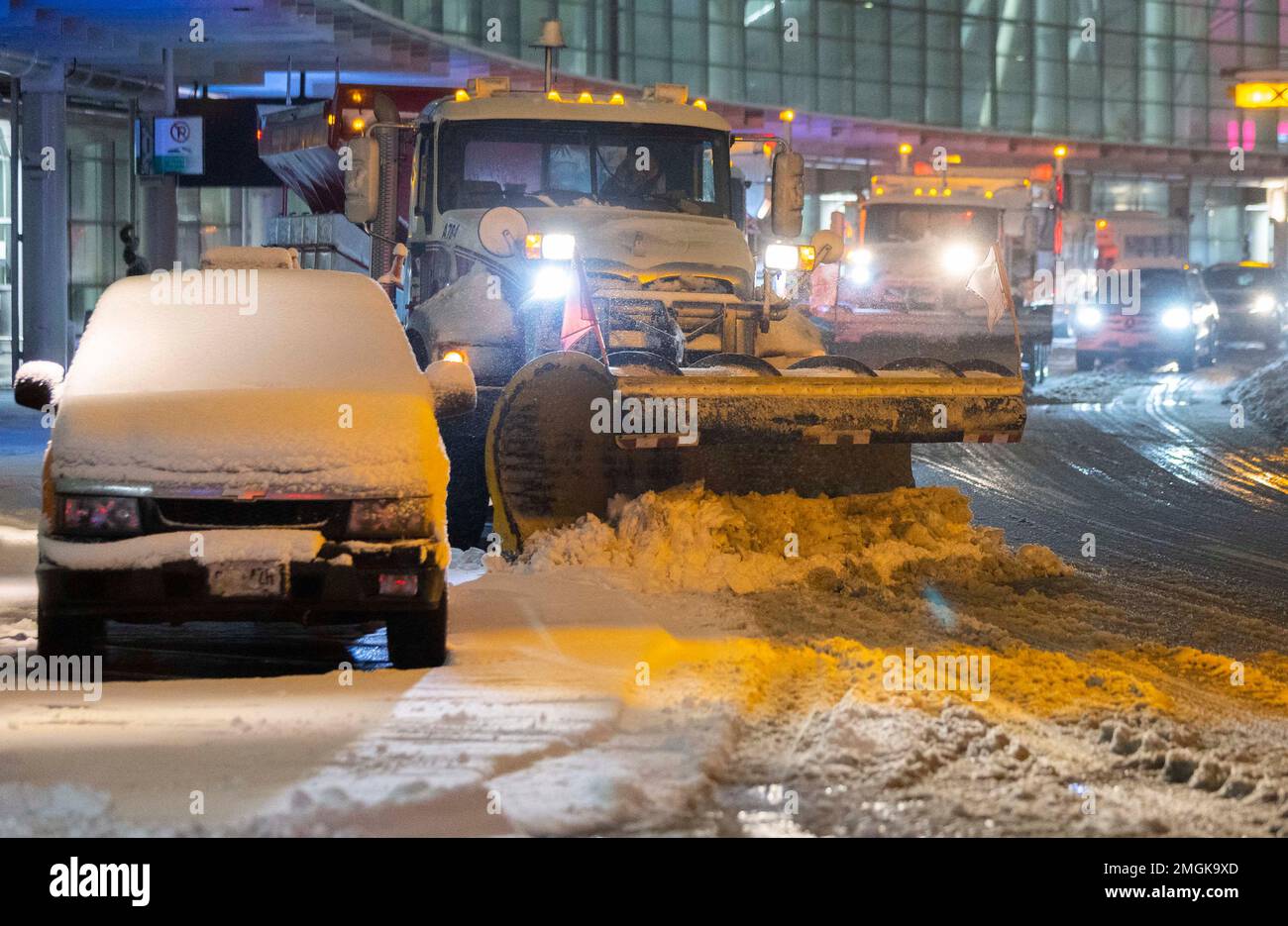 Toronto, Canada. 25th Jan, 2023. Snow plows clear snow on a street in