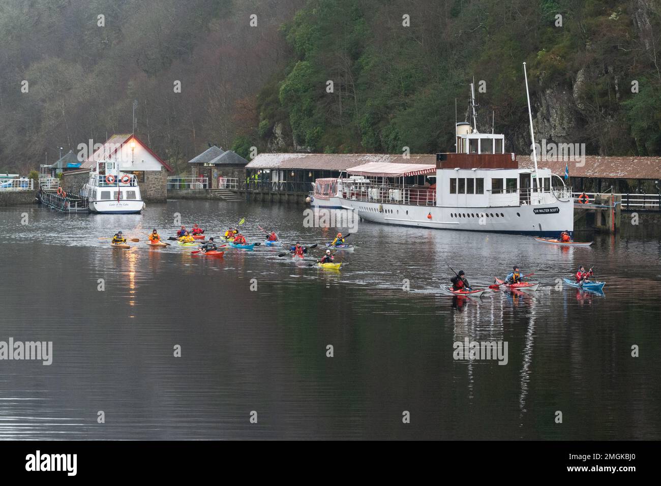 Group of Kayakers on Loch Katrine in winter, Trossachs, Scotland, UK Stock Photo