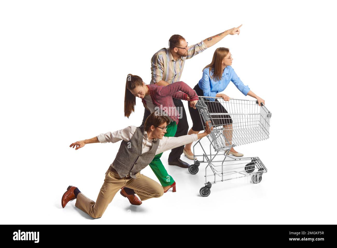 Group of excited emotional young people, office employees pushing