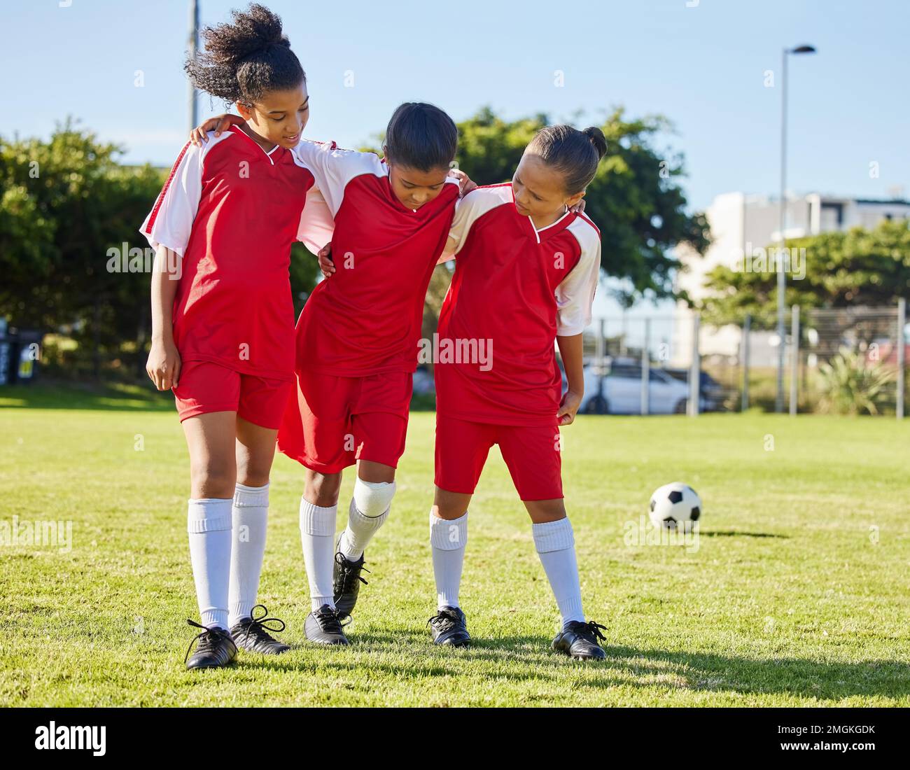 Soccer, injury and children team help, support and walk with hurt