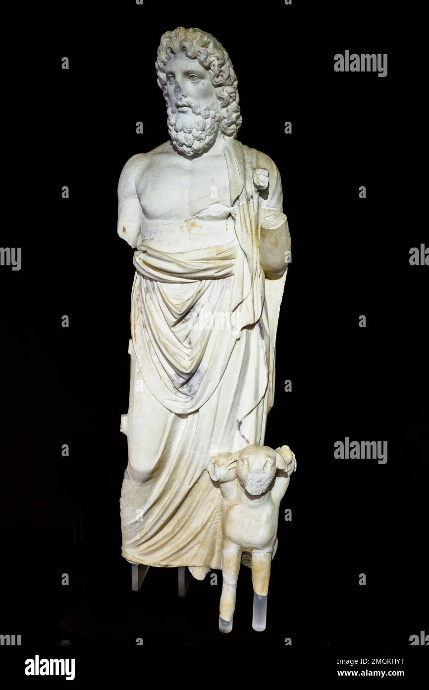 Statue of Serapis-Hades with Cerberus. Parian marble, with traces of colours. Roman copy (2nd century AD) from an original of late 3rd century BC - Museo Archeologico Regionale Paolo Orsi - Syracuse, Sicily, Italy Stock Photo