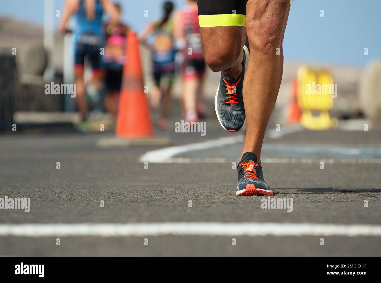 Marathon running race, runners feet on road Stock Photo Alamy