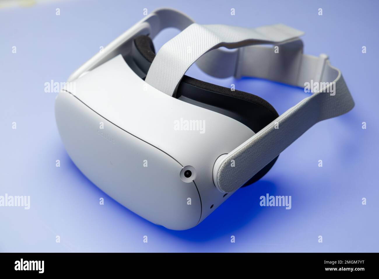 White new generation VR headset isolated on white background with blue