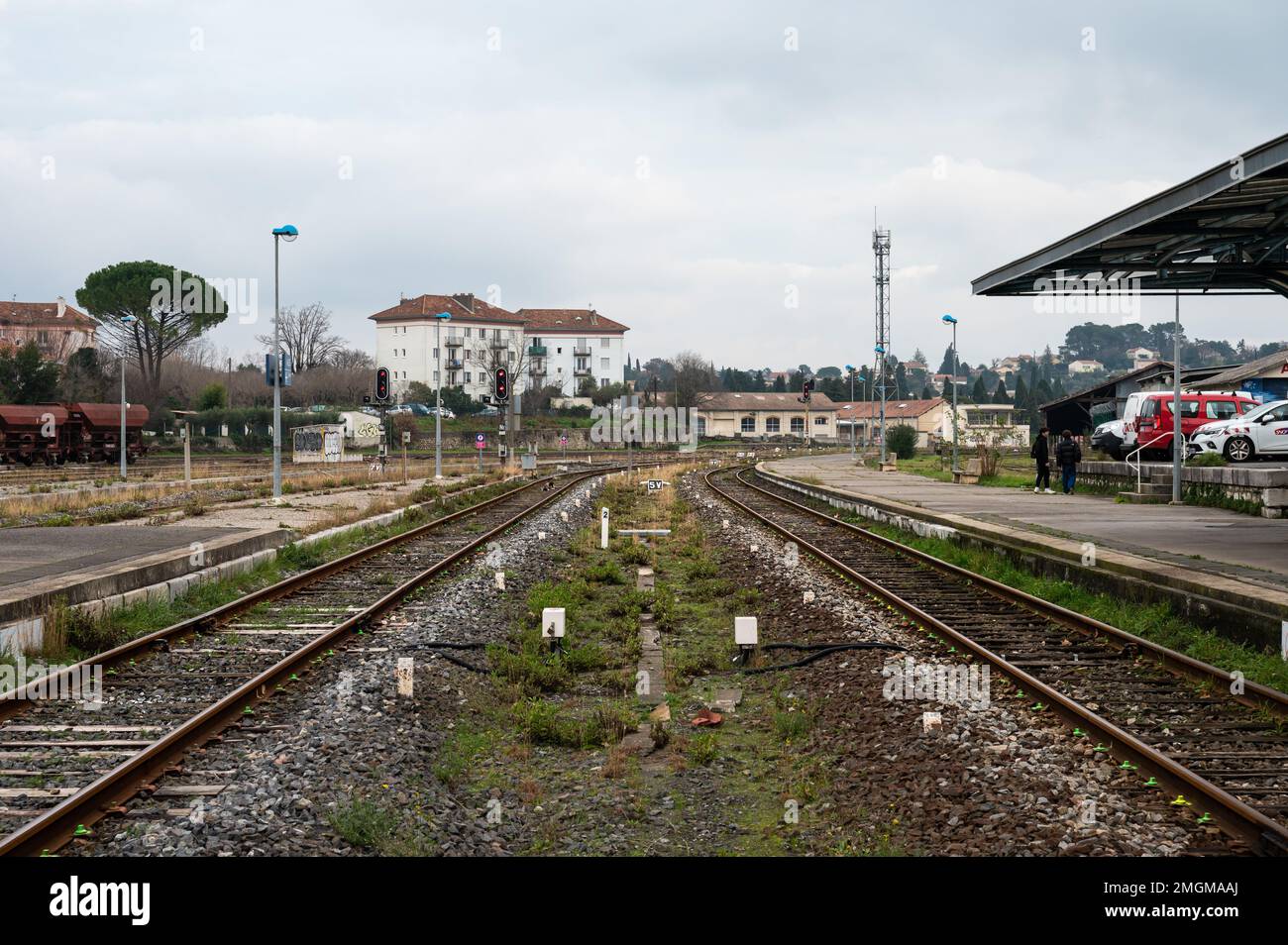 Local Raiway Station Ales, Occitanie, France, 12 30 2022 - Two empty railways and platform ...