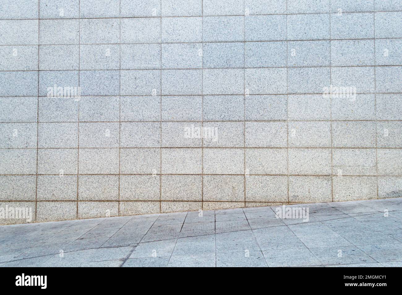 Gray wall from stone blocks for advertisement background. Stock Photo