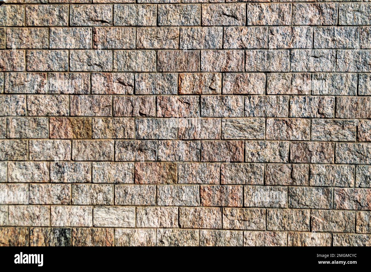 Gray wall from stone blocks for advertisement background. Stock Photo