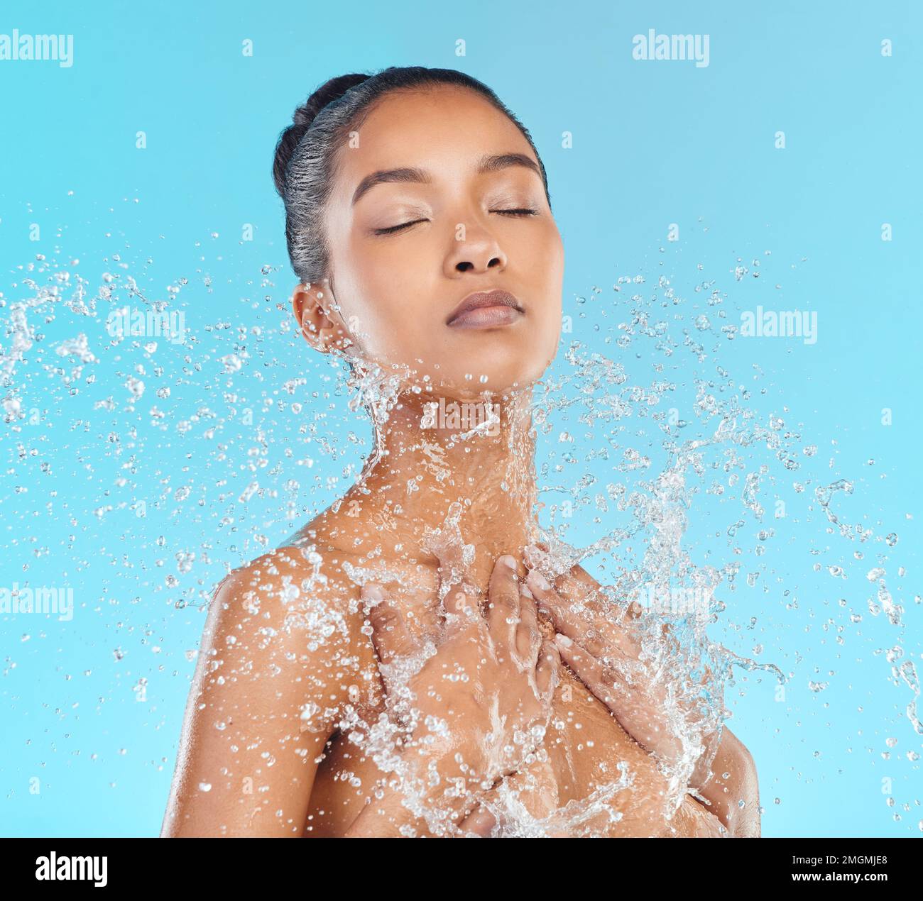 Studio shower, water and black woman cleaning body with liquid for