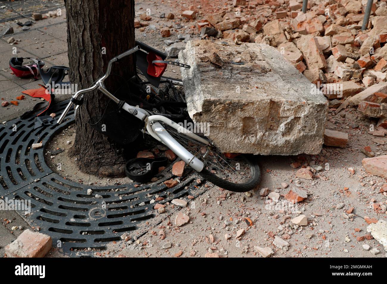 A bicycle is crushed by falling debris after an earthquake in Zagreb ...