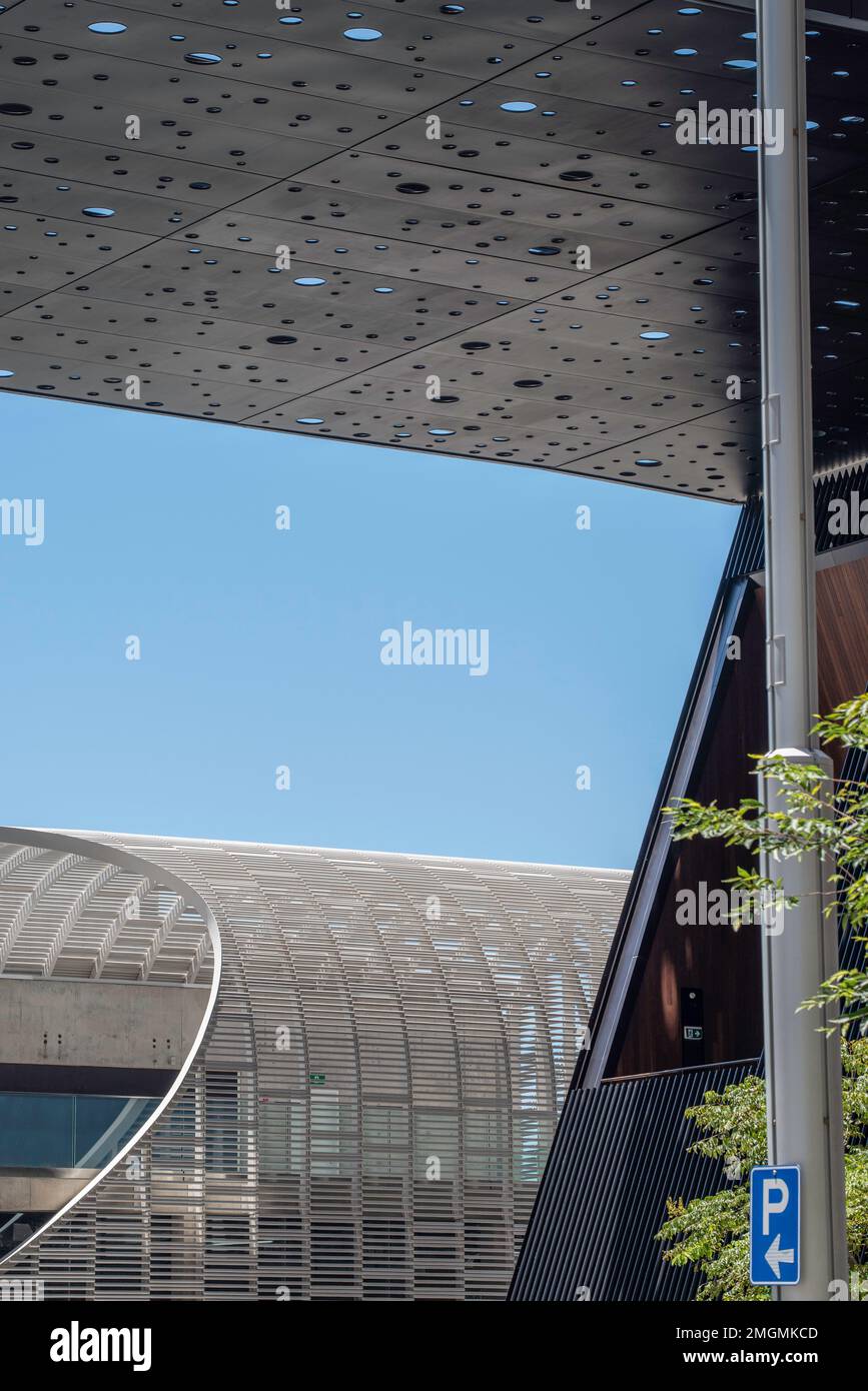 A partial view of the perforated steel canopy and Plaza Building by