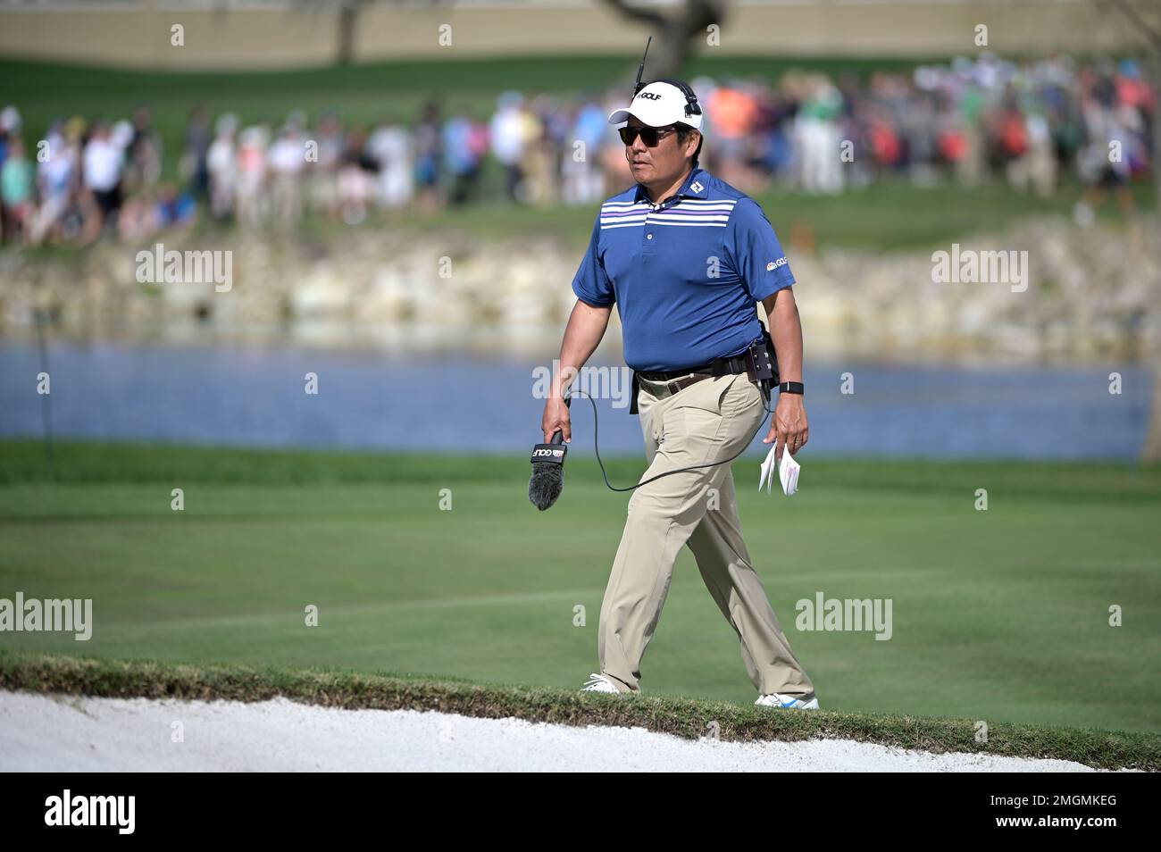 NBC Sports and Golf Channel television analyst Notah Begay III walks onto the 14th green during the final round of the Arnold Palmer Invitational golf tournament, Sunday, March 8, 2020, in Orlando,