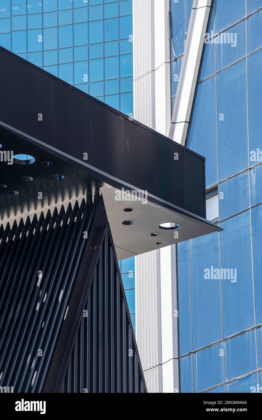 A partial view of the perforated steel canopy and Plaza Building by