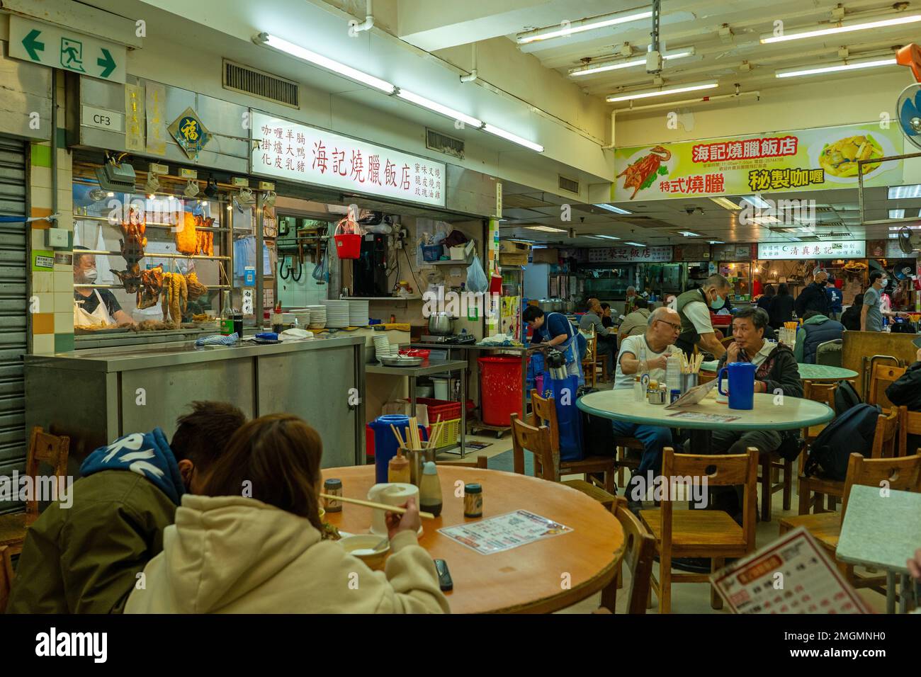 December 2022 - Hong Kong  Eating at Dai Pai Dong food Court in Wan Chai Stock Photo