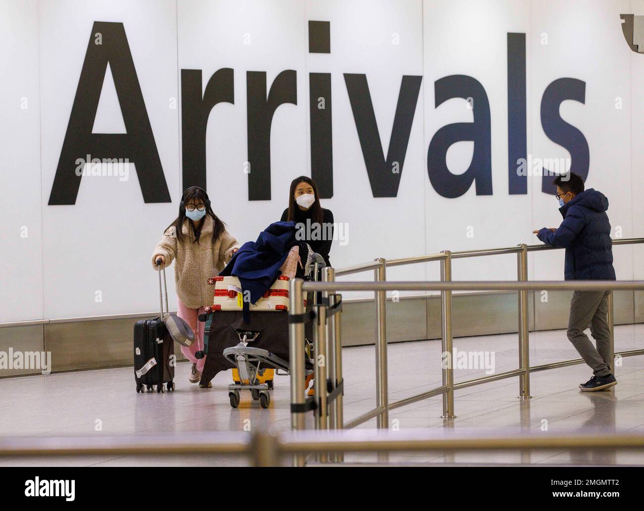 Heathrow Arrivals from Asia. From January 2023, if you travel (or return) from mainland China to England you must take a pre-departure COVID-19 test. Stock Photo