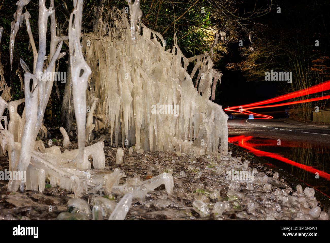 Ice formation at the side of a busy road, caused by traffic