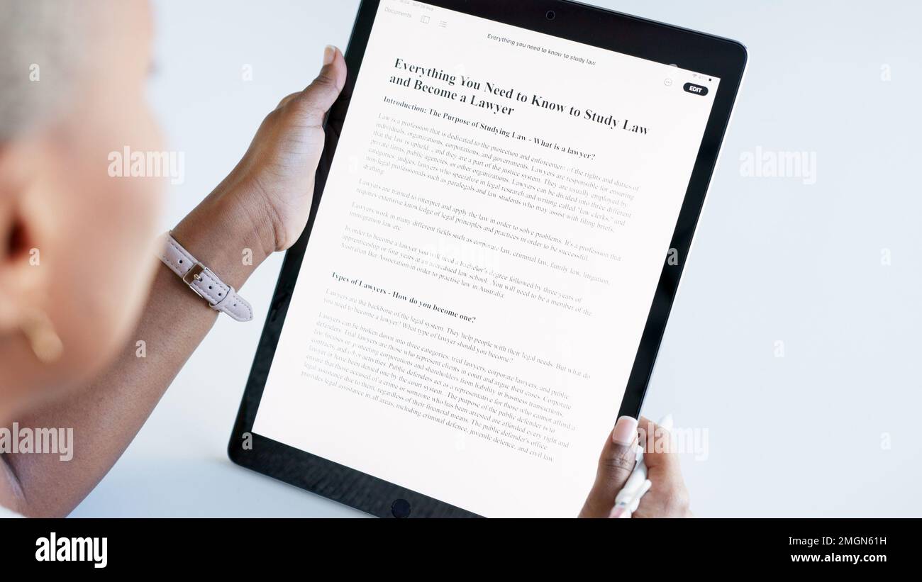 Student, lawyer scholarship and tablet online application while reading and doing research to study law with distance learning. Closeup woman Stock Photo