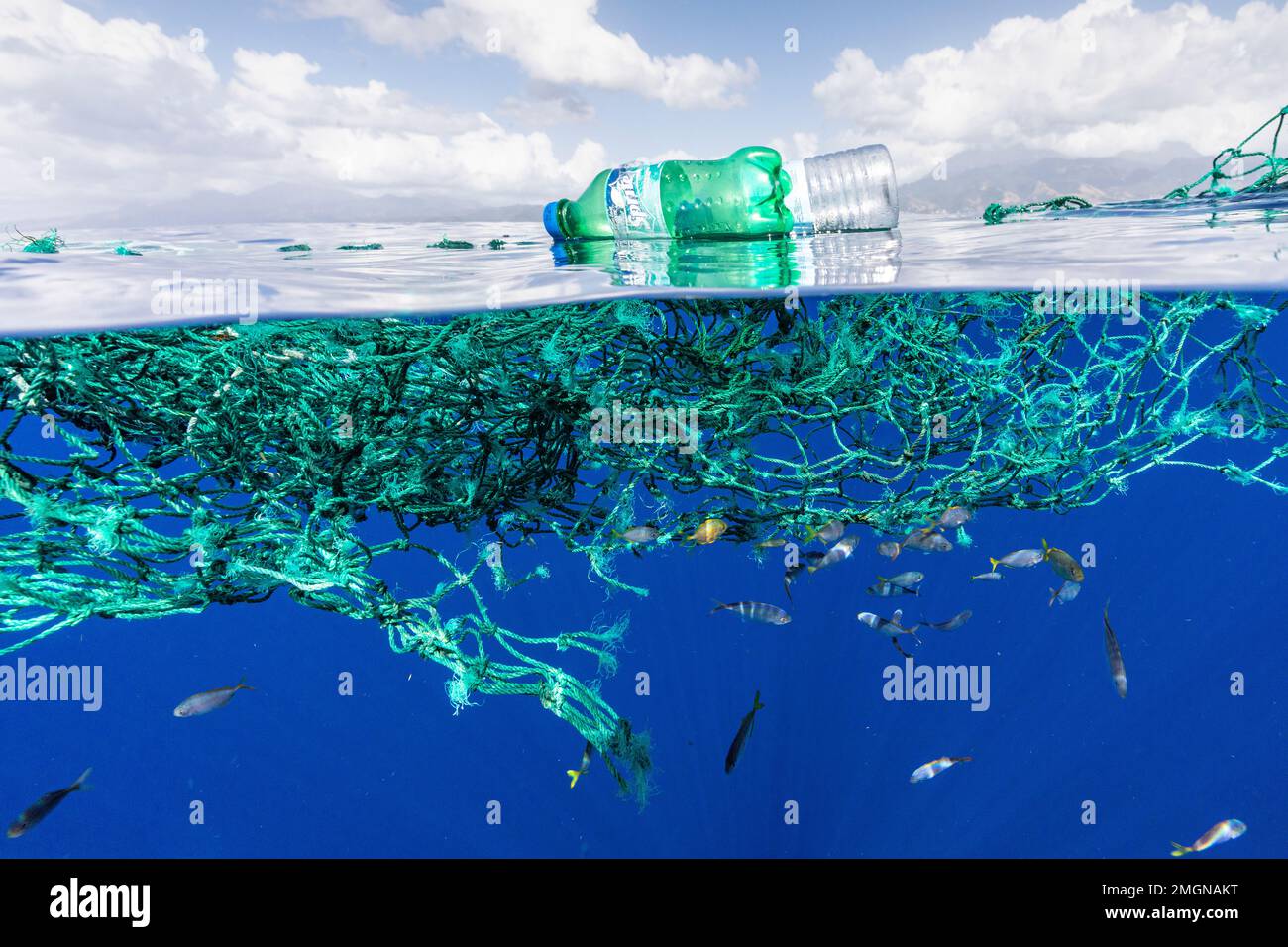 Ghost fishing nets, fishing nets and plastic bottles floating on the