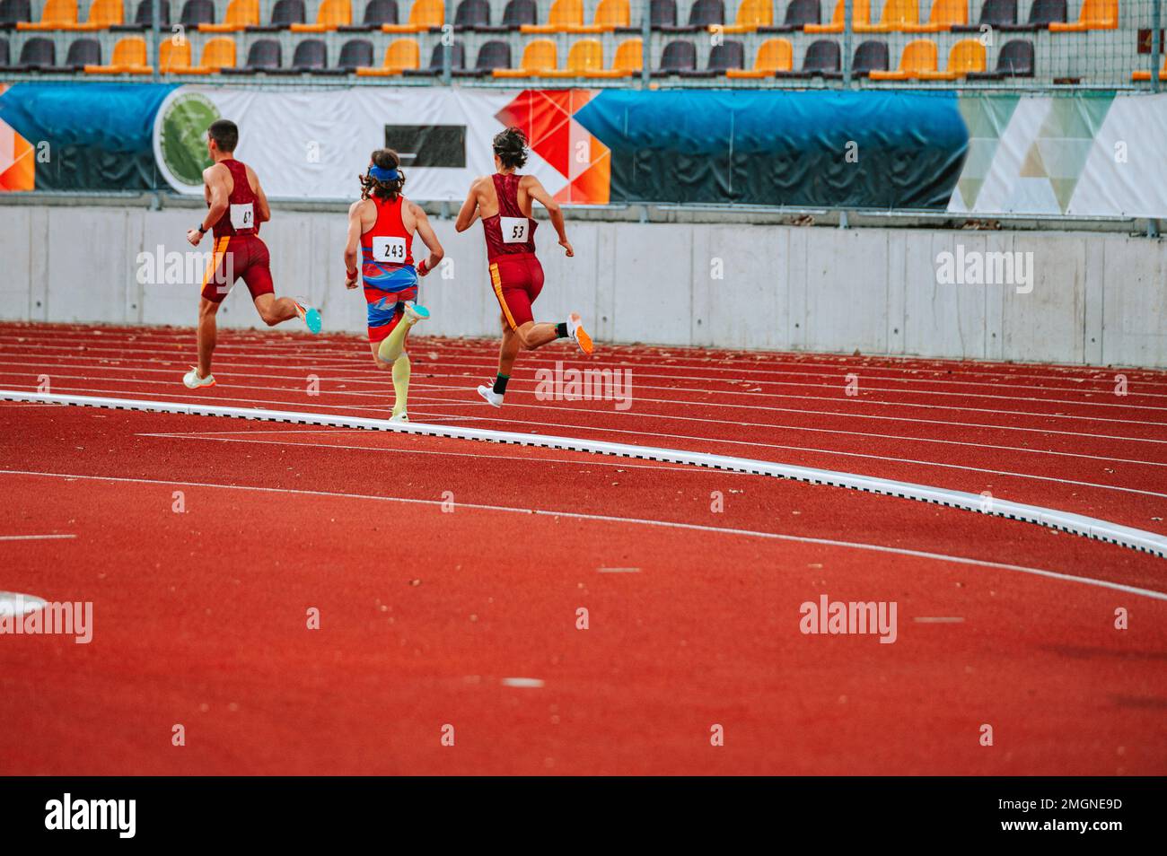 Dynamic image of male athletes legs in long distance race. Suitable for fitness and health-related campaigns Stock Photo