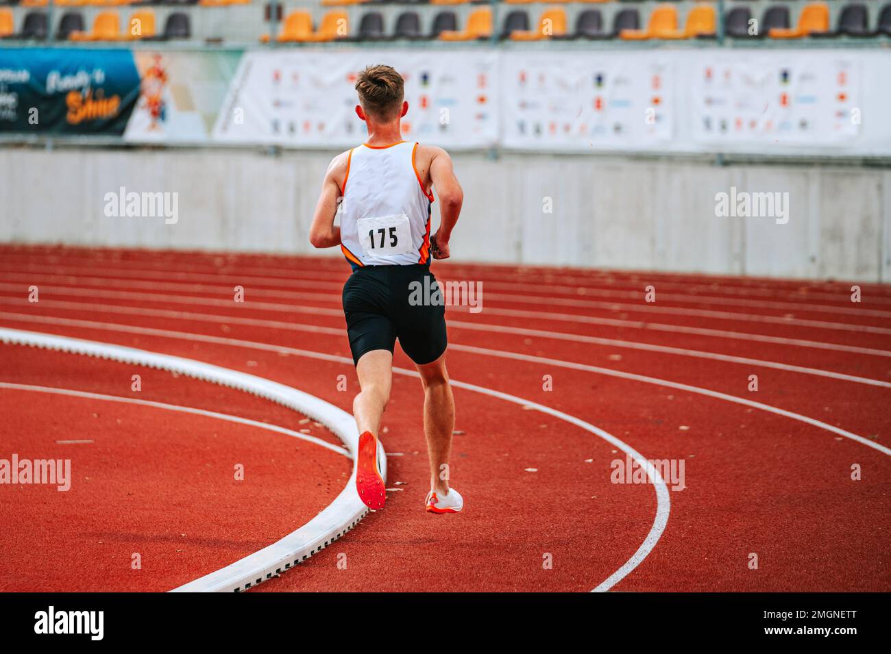 Highenergy image of male athletes in middle distance race. Perfect for