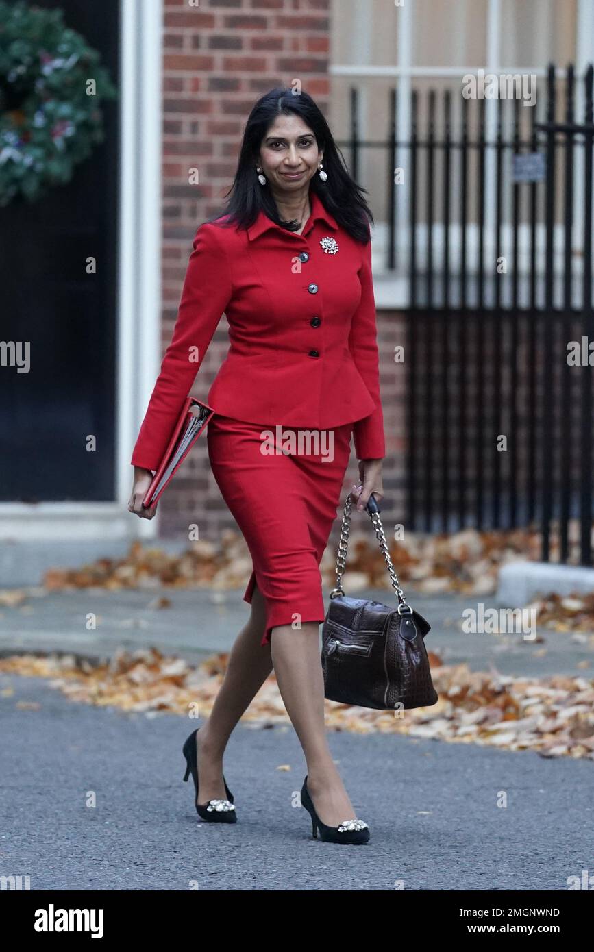 File photo dated 06/12/22 of Home Secretary Suella Braverman arriving in Downing Street, London. The Home Secretary has confirmed that the UK Government is rowing back on commitments made following the discovery of the Windrush scandal. In a written statement in the House of Commons, Ms Braverman said she would not be establishing a migrants' commissioner - ditching a recommendation made following a scathing review into how the scandal unfolded at the Home Office. Issue date: Thursday January 26, 2023. Stock Photo