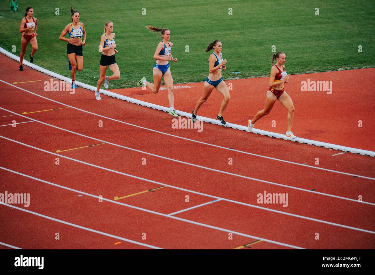 MARTIN, SLOVAKIA, 16 JULY, 2022: Female athletes pushing their limits during a 1500m race, highlighting the importance of physical and mental preparat Stock Photo